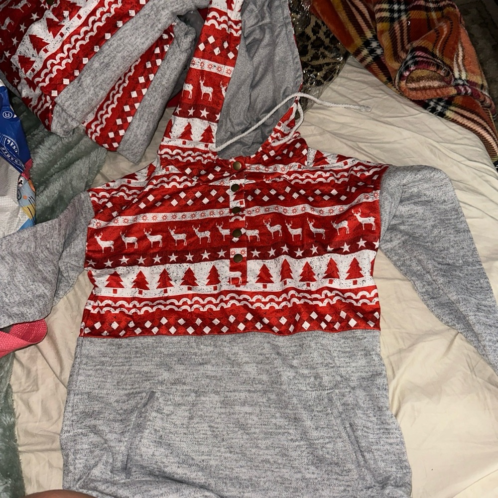 Christmas sweater with deer and Christmas tree quarter button up with hood.